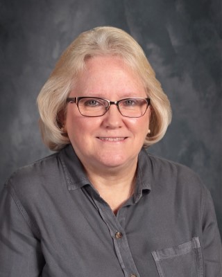 closeup shot of a lady with specs