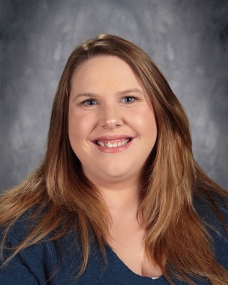 Smiling headshot of Miss Shafer